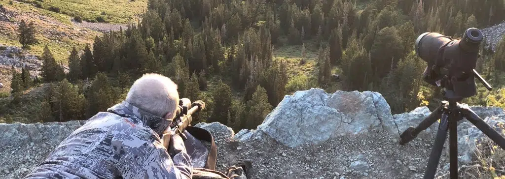 Hunter Looking Through Scope, Mule Deer Hunting, Wyoming, USA